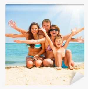 Happy Family Having Fun At The Beach
