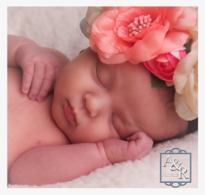 Newborn Baby Asleep With Flower Crown