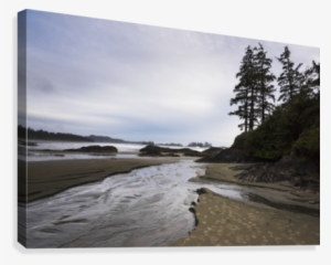 Stream Of Water Flowing On The Beach From The Ocean