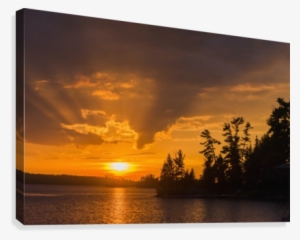 Sunrise Casting An Orange Glow Over The Sky And Reflected