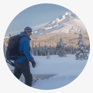 Snowshoer With Large Backpack Makes His Way Across - Mount Hood