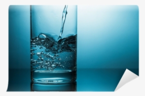 Closeup Of Pouring Water In Glass In Blue Light Wall - Graphic Design