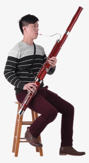 Musician Playing The Bassoon - Person Playing Bassoon