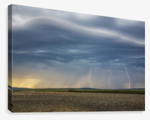 Lightning Bolts Descend From Dark Clouds Over The Tundra