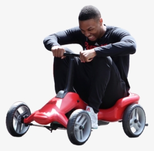 Persondamian Lillard Riding A Little Red Car - Idaho
