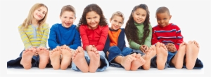 Children Sitting With Feet Showing - Kids Feet