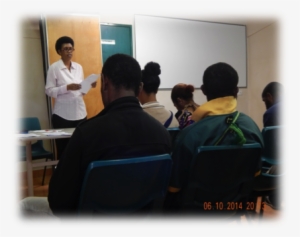 A Staff Of Rcf Talking To Students - Classroom