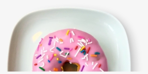 A Vanilla Sprinkles Doughnuts On A Plate - Doughnut