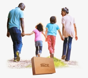 Two Adults Walking Hand In Hand With Two Children Along - Child