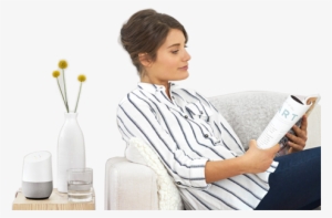 Woman In Chair Listening To Google Home Music - Google Home User
