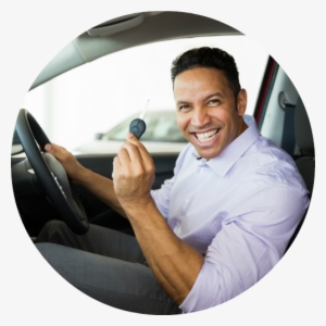 Happy Man Sitting In Driver's Seat Holding Up Car Key - Car