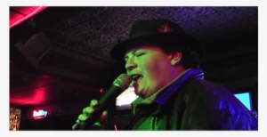 A Karaoke Singer Must Rescue His Beautiful Muse From - Singing