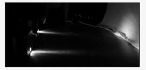 The Lightboxes Projecting Beams Of Light On The Floor - Darkness