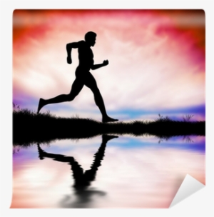 Silhouette Of Man Running At Sunset Wall Mural • Pixers®