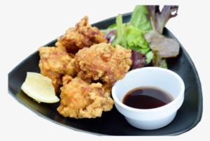 Juicy Fried Chicken Thigh With An Original Garlic Pepper - Jinya Ramen Bar