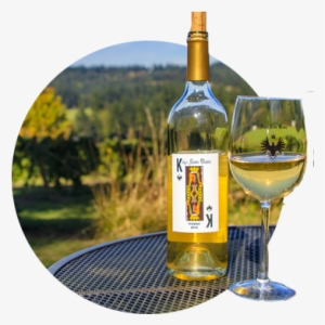 Close-up Of Bottle And Glass Of King's Raven Pinot - Common Grape Vine