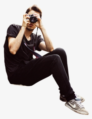 A Hipster Looking Man Is Seated On A Hill And Taking - Person Sitting On The Edge Png