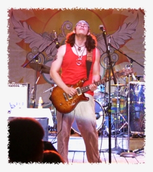 Fronted By Mexican-born Javier Vazquez On Guitar And - Rock Concert