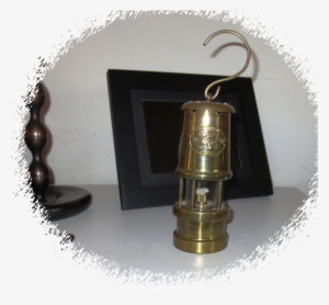 A Really Old, Slightly Bent Welsh Mining Lantern Sitting - Cape Hatteras Lighthouse Tile Coaster