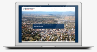 Laptop Showing Harrisonburg Tourism Website - Tablet Computer