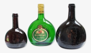 The Bottles To The Left And Right Of Center Were Dug - Crème De Menthe