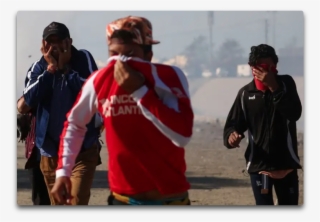 Tear Gas Border - Migrant Caravan Tear Gas