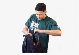 Nba Players Give Back To Children - Sitting