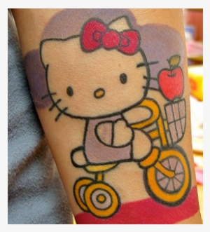Hello Kitty On Bike Color Ink Tattoo - Hello Kitty Tattoos
