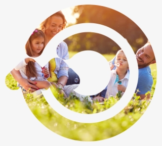 Family Outside In Grass Playing With Bubbles - Circle