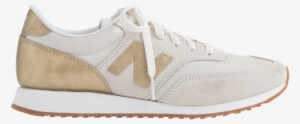 Gold New Balance 620, $80