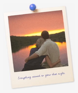 A Young Couple Leans In For A Kiss With An Orange Sunset - Picture Frame