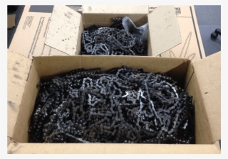 Pool Of Worn Chains As Received From The Bike Shops - Wall