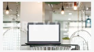 Black Laptop Mockup On A Glass Table In A Casual Home - Interior Design