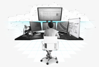 A Service Tech Sits In Front Of A Desk With Monitors - Solarwinds